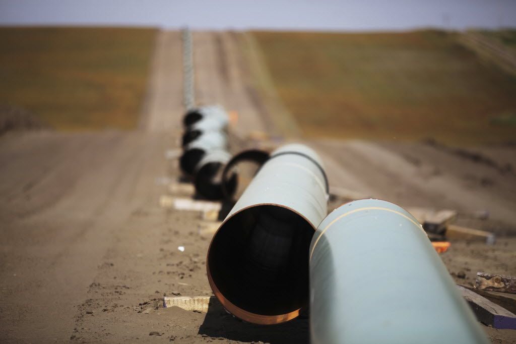 FILE -- A gas pipeline under construction in Belfield, N.D., Sept. 3, 2011. In another...