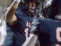 Allen quarterback General Booty celebrates after his touchdown run in the second quarter of...