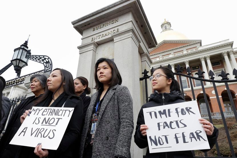 Jessica Wong, of Fall River, Mass., front left, Jenny Chiang, of Medford, Mass., center, and...