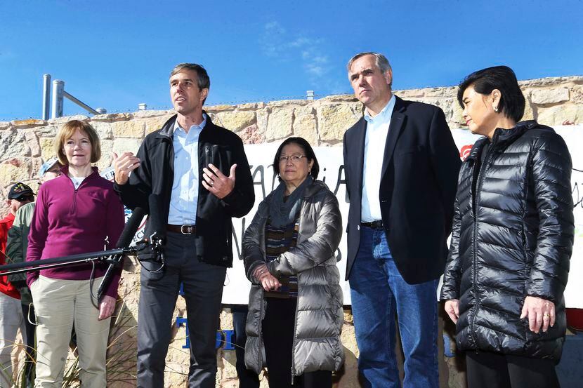 U.S. Rep. Beto O’Rourke, D-El Paso, second from left, speaks with a congressional delegation...