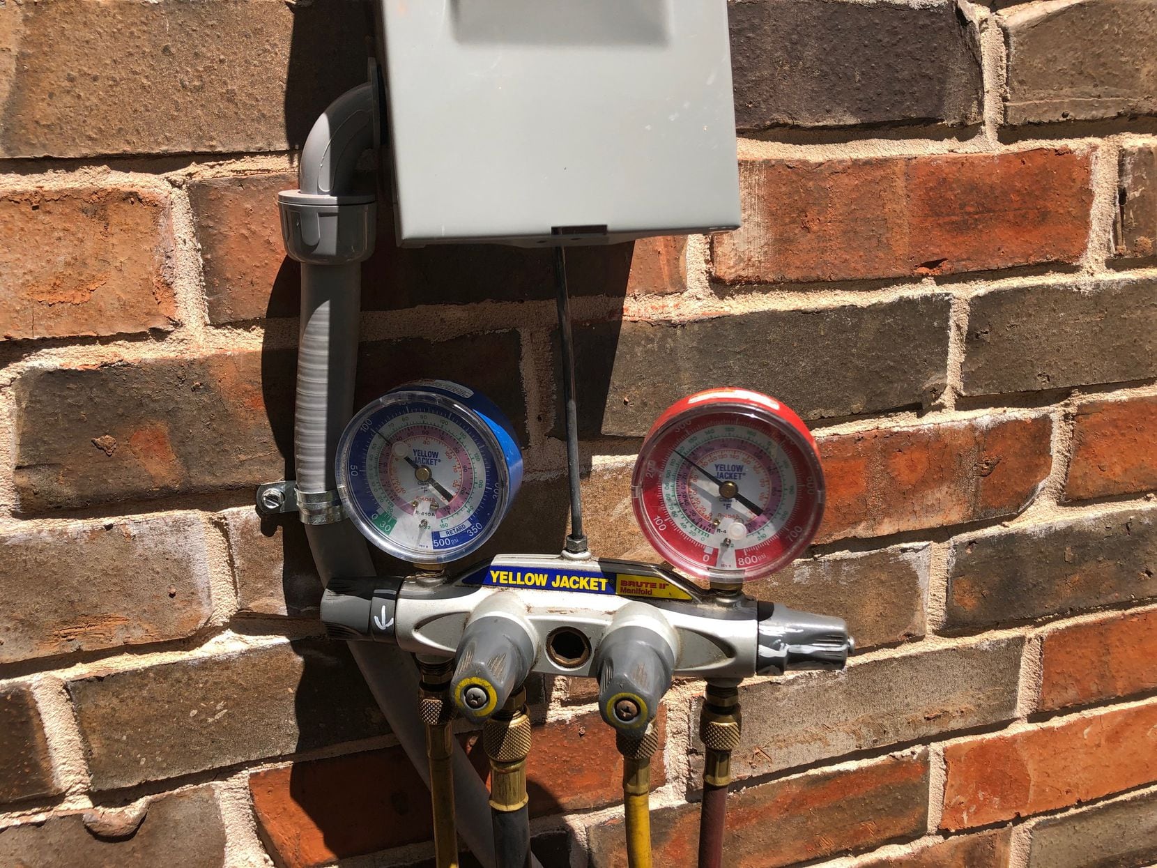 Watchdog Dave Lieber took this photo of the meter that measured the Freon leak at his house. It was 8 pounds 14; an environmental hazard and a tremendous waste of money to fill it up again.