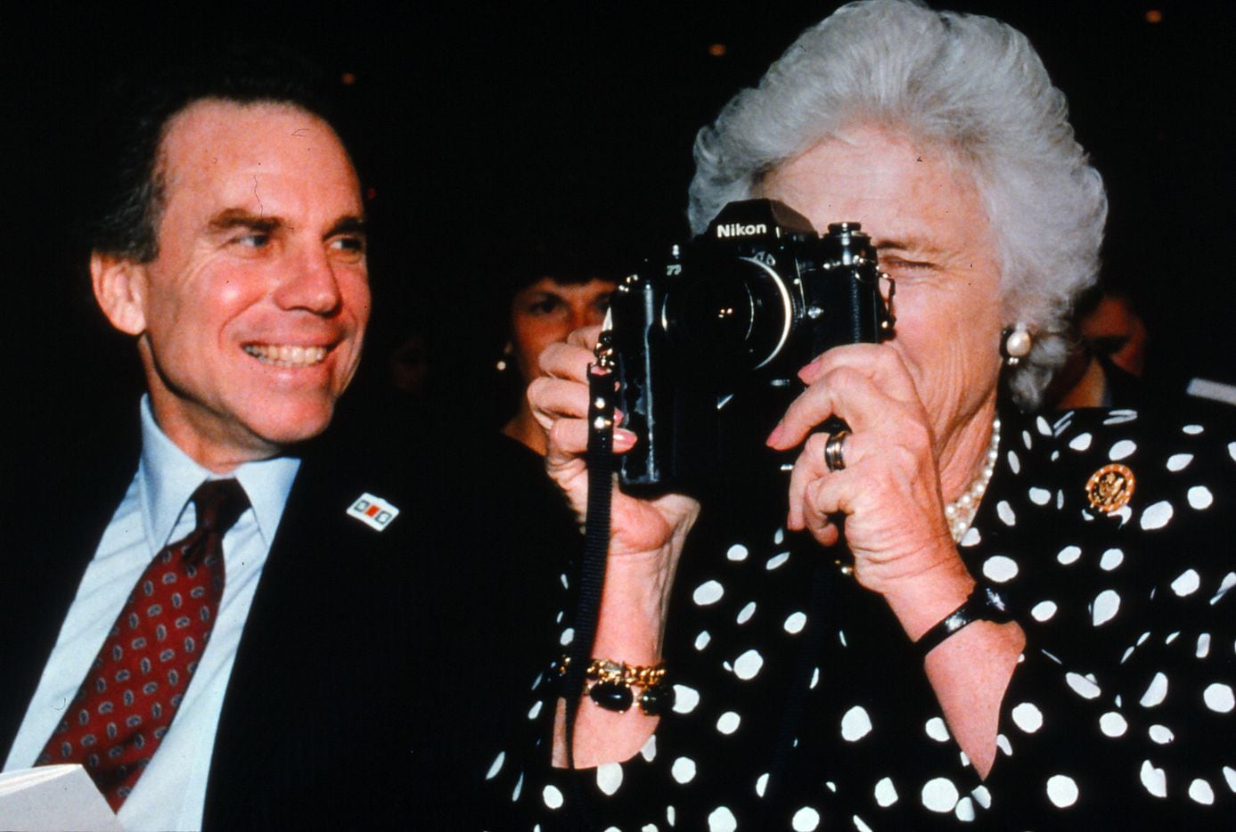 In 1988, Barbara Bush held the camera of a Dallas Morning News photographer, while sitting...