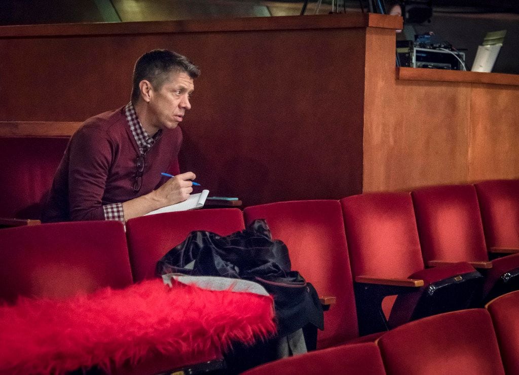 Director Joel Ferrell takes notes during the dress rehearsal of The Christians at the Kalita...