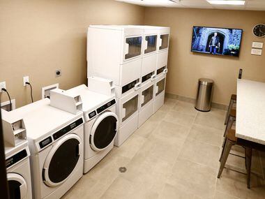 The laundry room for the Residence Inn Hotel in Dallas on Oct. 17, 2017. (Nathan...