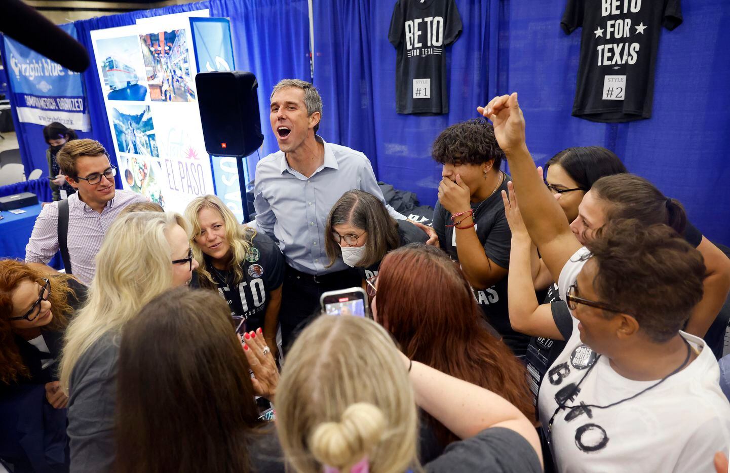 Democratic gubernatorial challenger Beto O'Rourke huddles up his staff and cheers at his...
