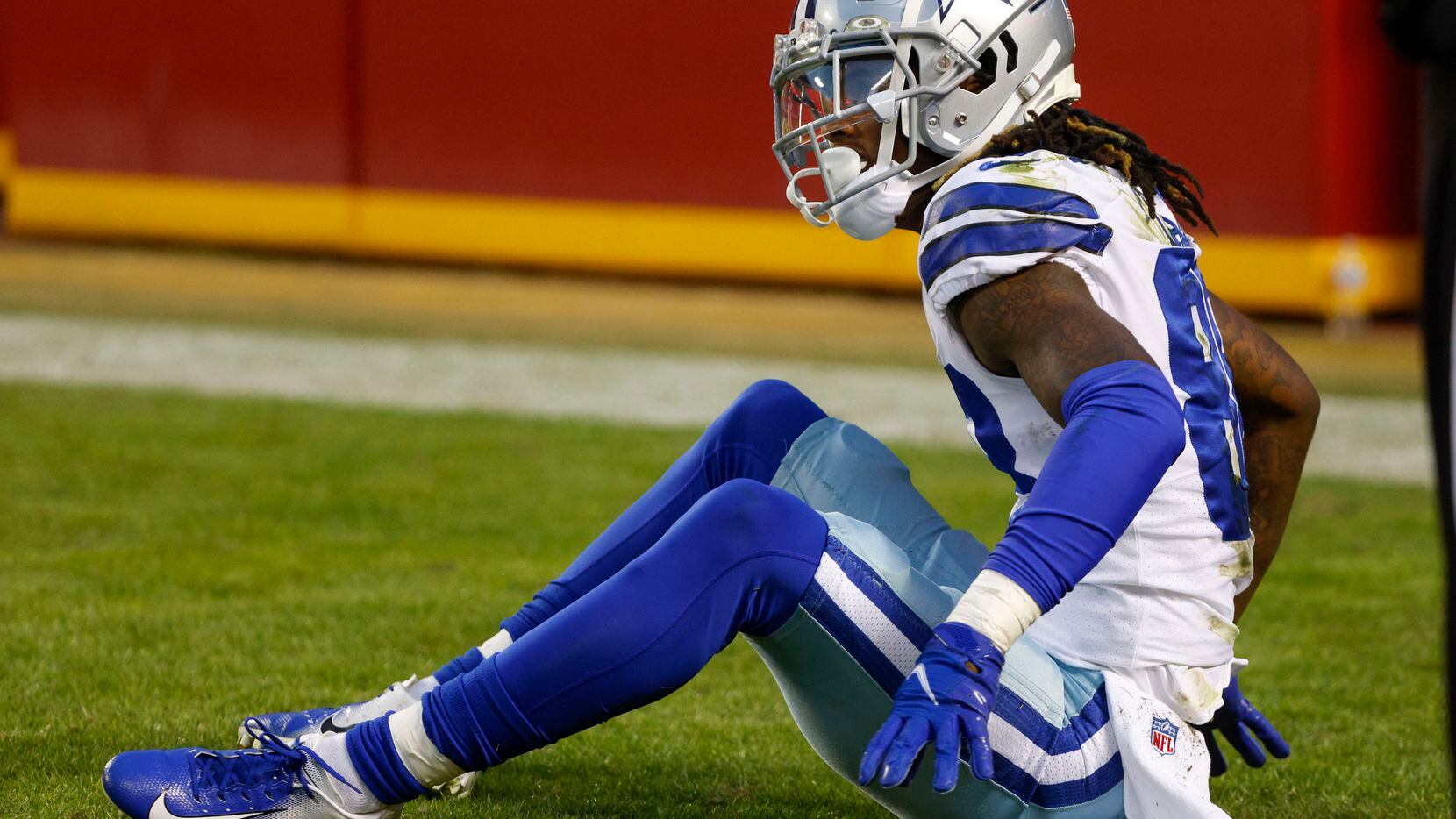 Dallas Cowboys wide receiver CeeDee Lamb (88) sits in the end zone after an interception from quarterback Dak Prescott (4) during the first half of an NFL football game against the Kansas City Chiefs at Arrowhead Stadium on Sunday, Nov. 21, 2021, in Kansas City, Missouri.