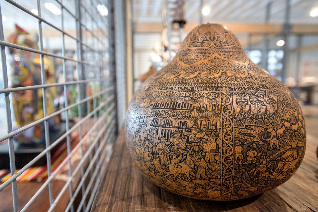 A Peruvian carved gourd called a "mate."
