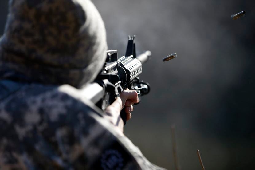  Jeff Franz, a member of the Bureau of American-Islamic Relations, shot at a target for...