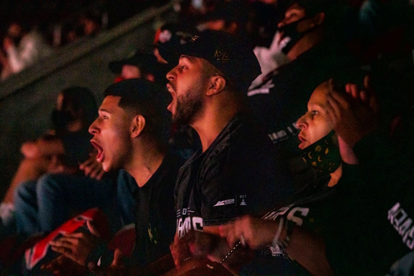 From left, Anthony “Shotzzy” Cuevas-Castro brothers Steven Quevedo, Gabriel Castro, and his mother Christina Hernandez cheer as they watch their Shotzzy compete during the winners final of the Call of Duty league playoffs at the Galen Center on Saturday, August 21, 2021 in Los Angeles, California. The Empire lost to FaZe 0 - 3 in their first match of the day but are still in contention to play in the finals through the elimination finals. (Justin L. Stewart/Special Contributor)