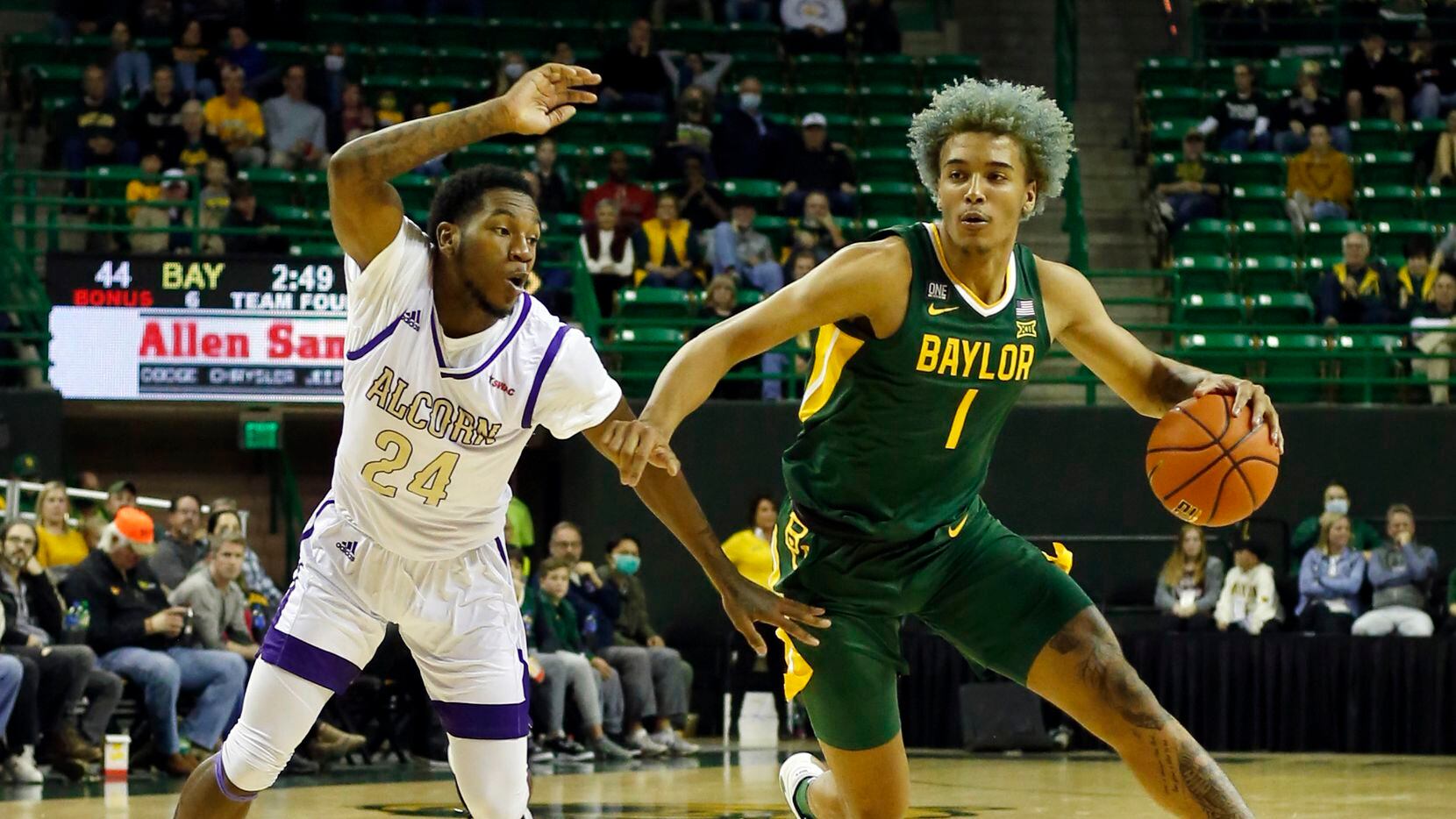 Baylor forward Jeremy Sochan (1) drives past the defense of Alcorn State guard Mike Pajeaud...