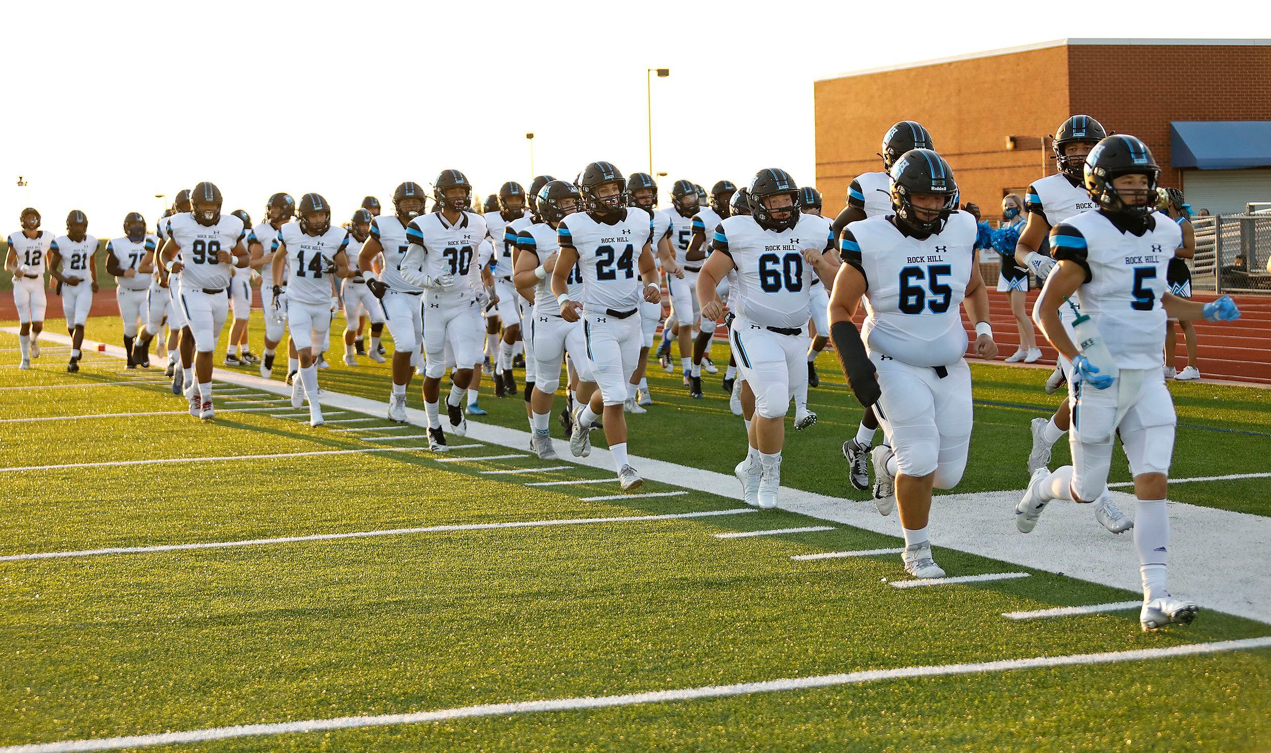 Rock Hill High School takes the field for the first time as Heritage High School hosted Rock...