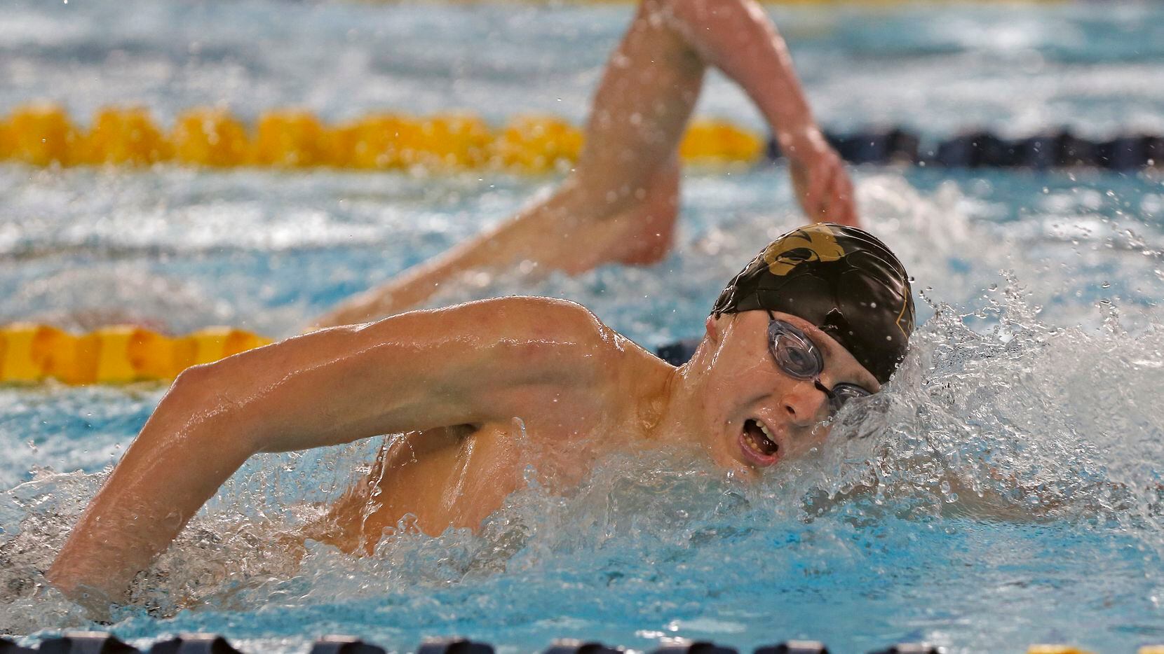 Trey Dickey, Plano East wins 500 yard Freestyle in UIL boys 6A swim finals on Friday,...