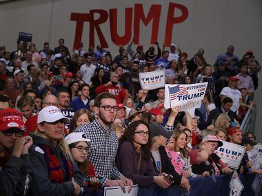 GRAND RAPIDS, MI - NOVEMBER 08:  Supporters listen to Republican presidential nominee Donald...