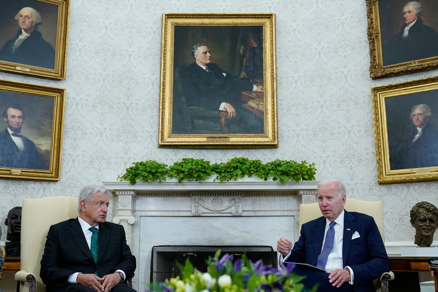 President Joe Biden, right, meets with Mexico's President Andres Manuel Lopez Obrador, left,...