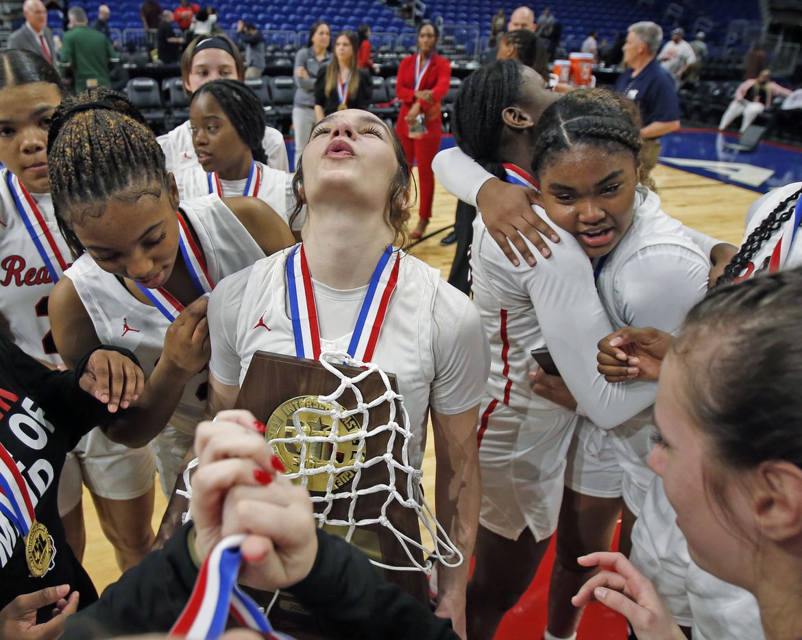 Frisco Liberty Jezelle Jolie Moreno (0) holds up their trophy as they Frisco Liberty...