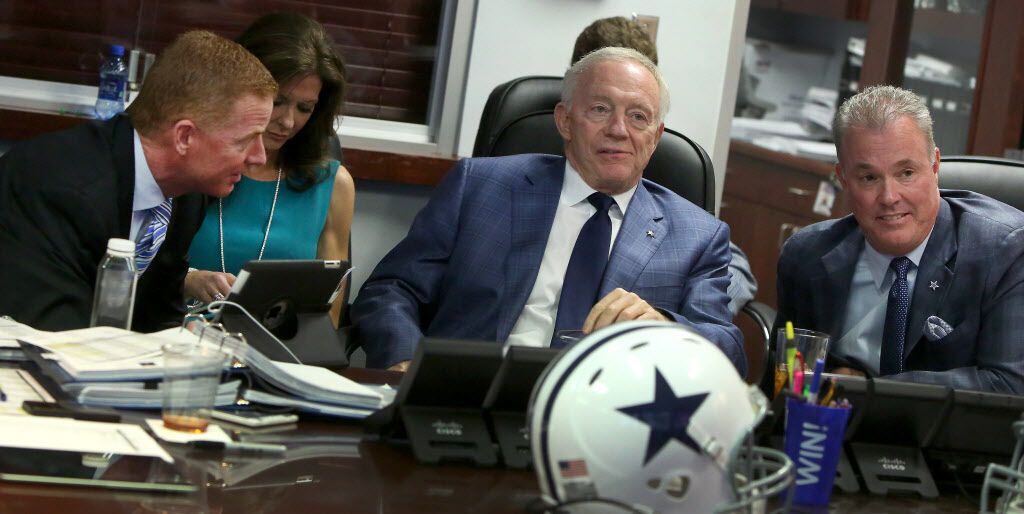 (L-R) Dallas Cowboys Head Coach Jason Garrett, Owner Jerry Jones and his son Executive Vice...