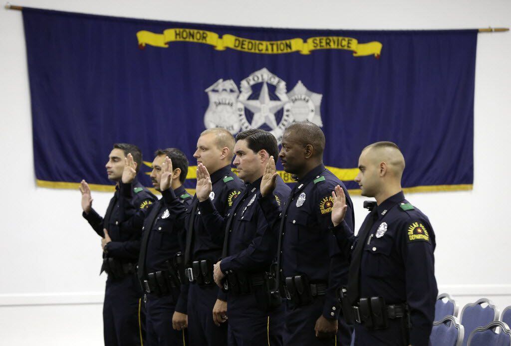Dallas police officers were sworn in during their graduation ceremony at the Dallas Police...