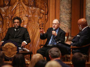 Harvard professor Cornel  West, left, and civil liberties lawyer Alan Dershowitz debate ways...