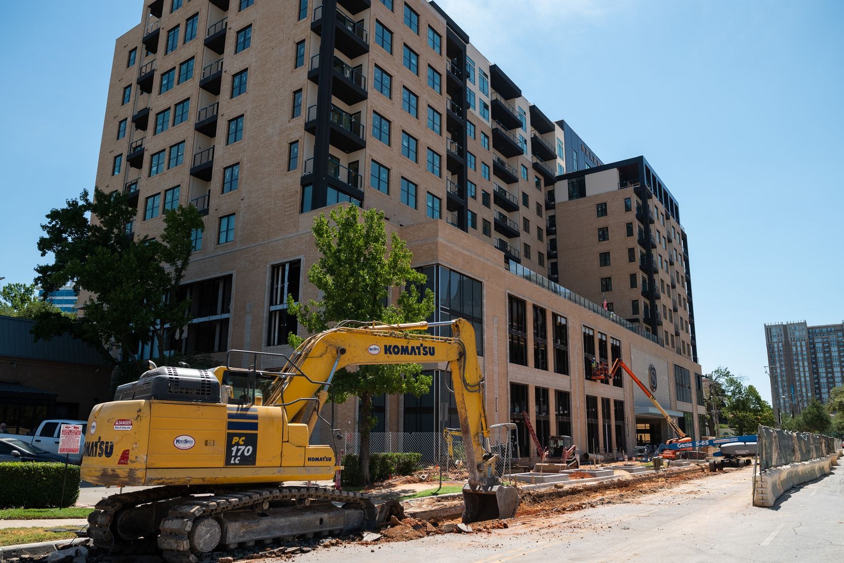 Construction crews work on Kairoi Residential's Selene apartments on Maple Avenue in Uptown...