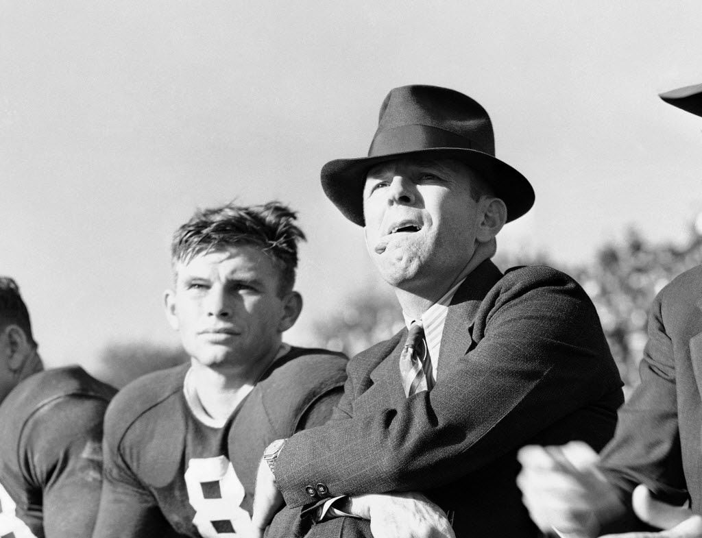 ORG XMIT: APHS142910 Coach Dutch Meyer of Texas Christian University, right, continued an...