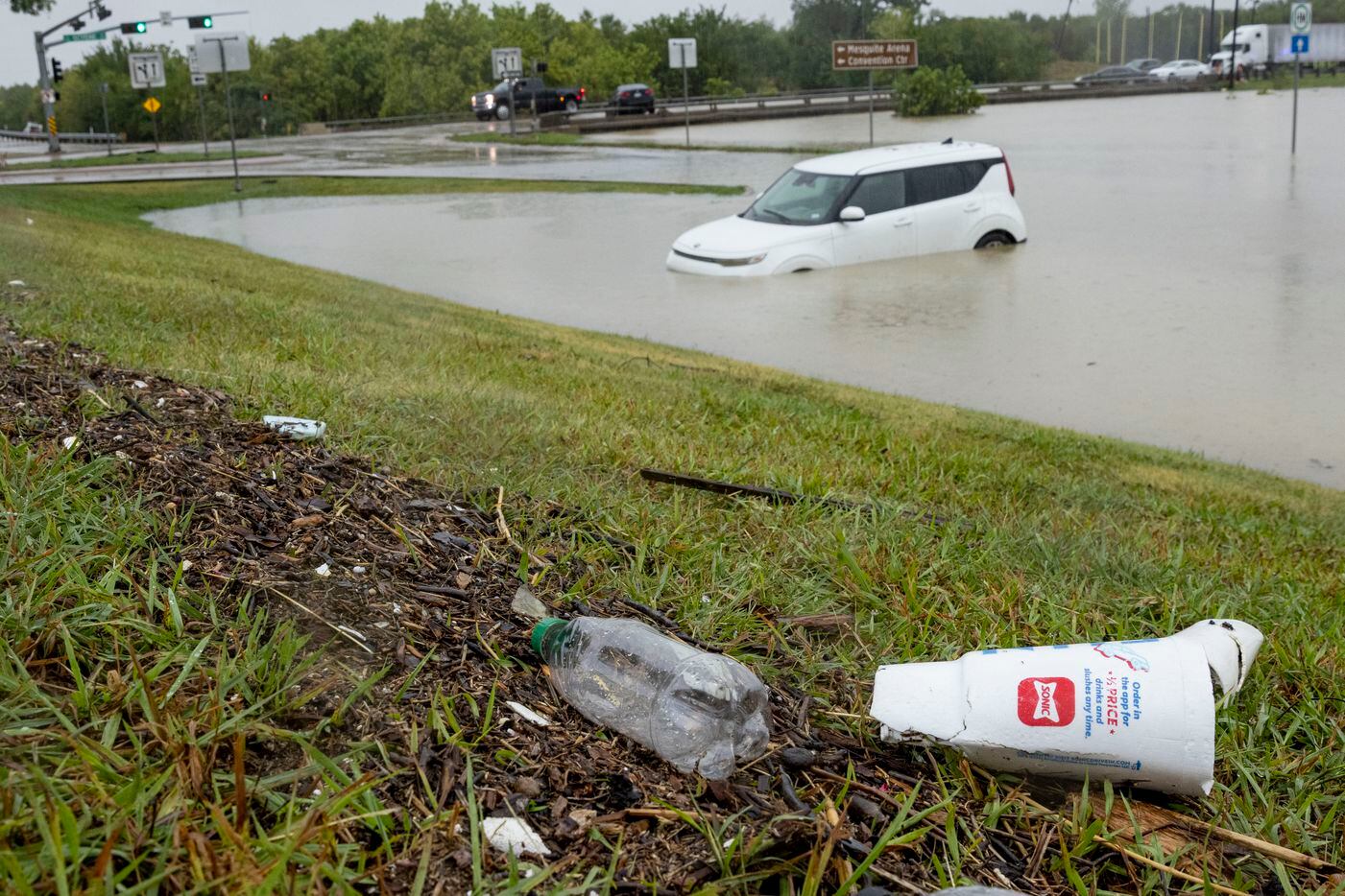 The area where the water line reached can be seen as stalled cars sit abandoned on the...