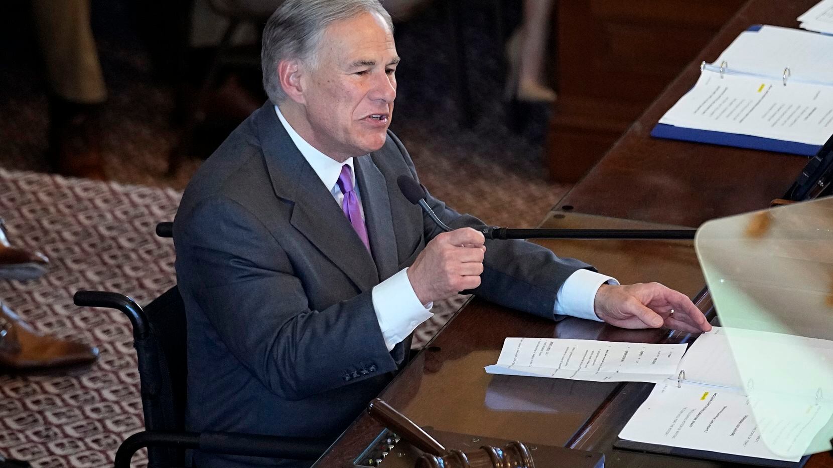 Texas Gov. Greg Abbott addresses the Texas House at the Capitol during the first day of the...