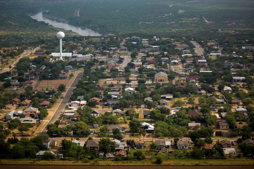 An aerial view shows the city El Cenizo, Texas,  on the banks of the Rio Grande on Thursday,...