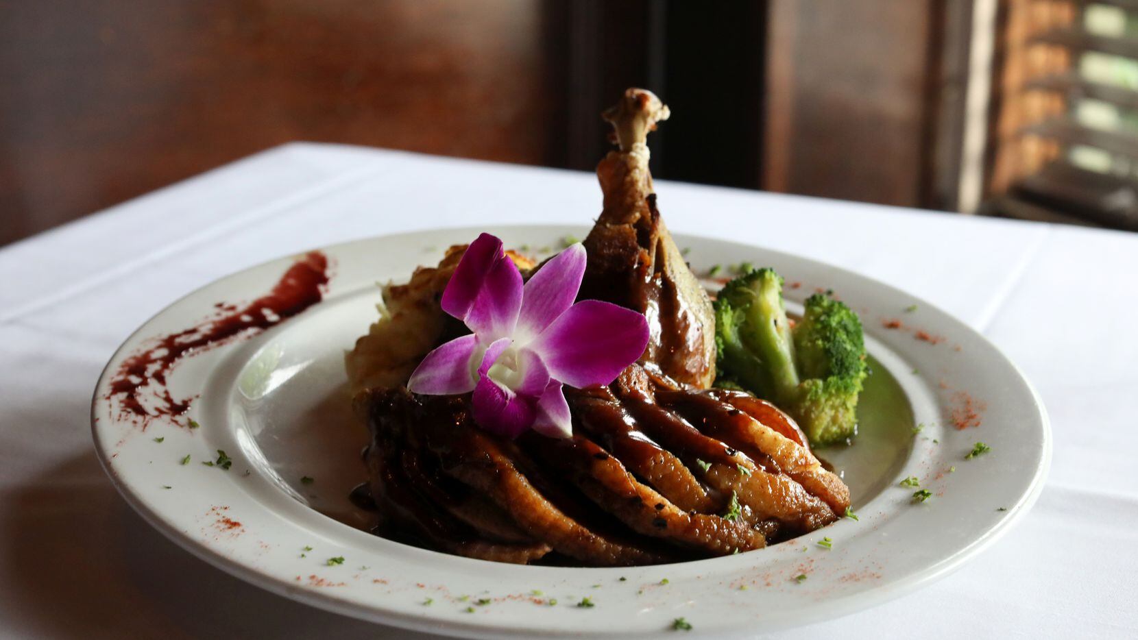 The Le Demi Canard a l’Orange Duck at St. Martin's Wine Bistro is a staple at the longtime...