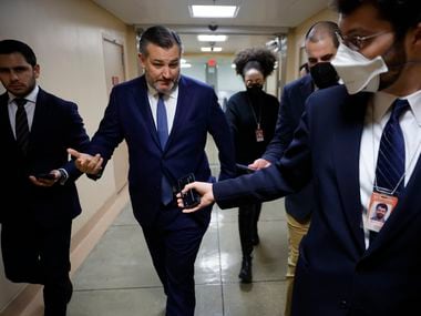 Sen. Ted Cruz talks to reporters at the U.S. Capitol on Jan. 10, 2022.