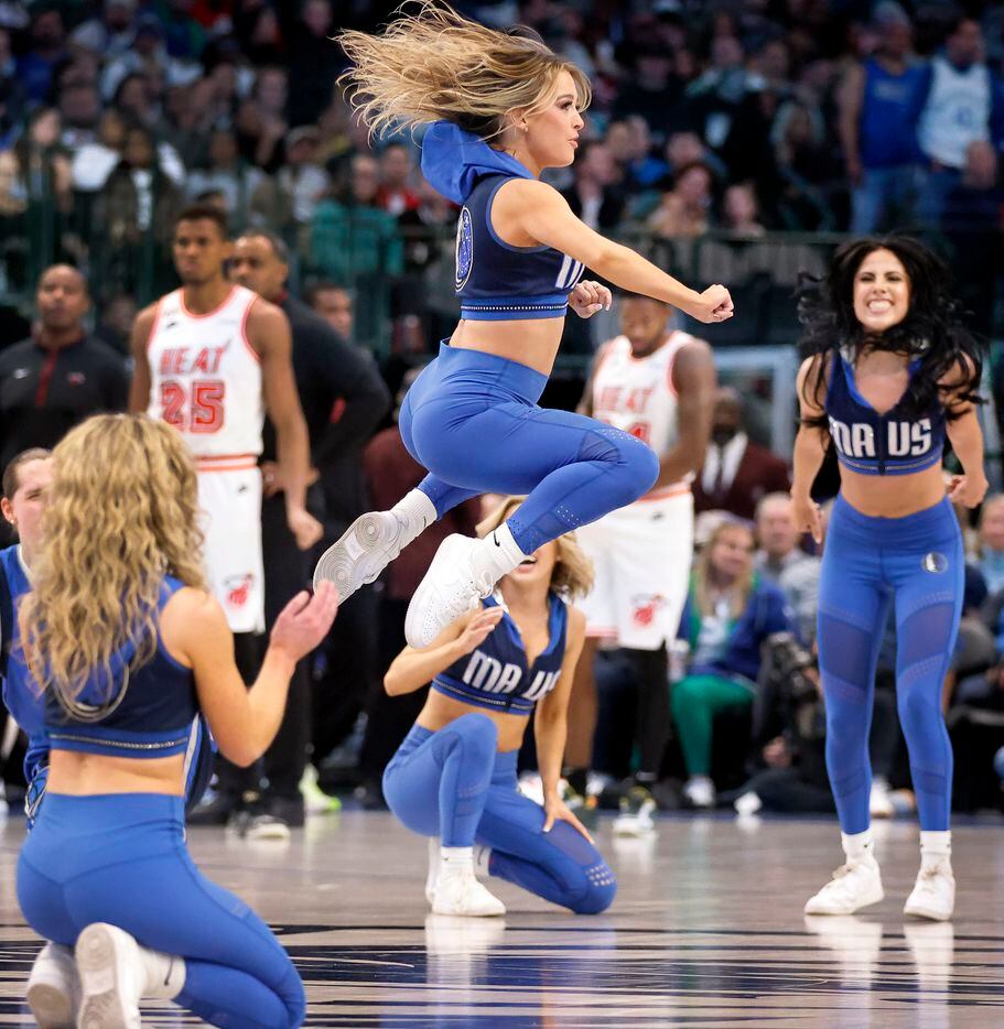 Members of the Dallas Mavericks D-Town Crew perform during the second half of the Miami Heat...
