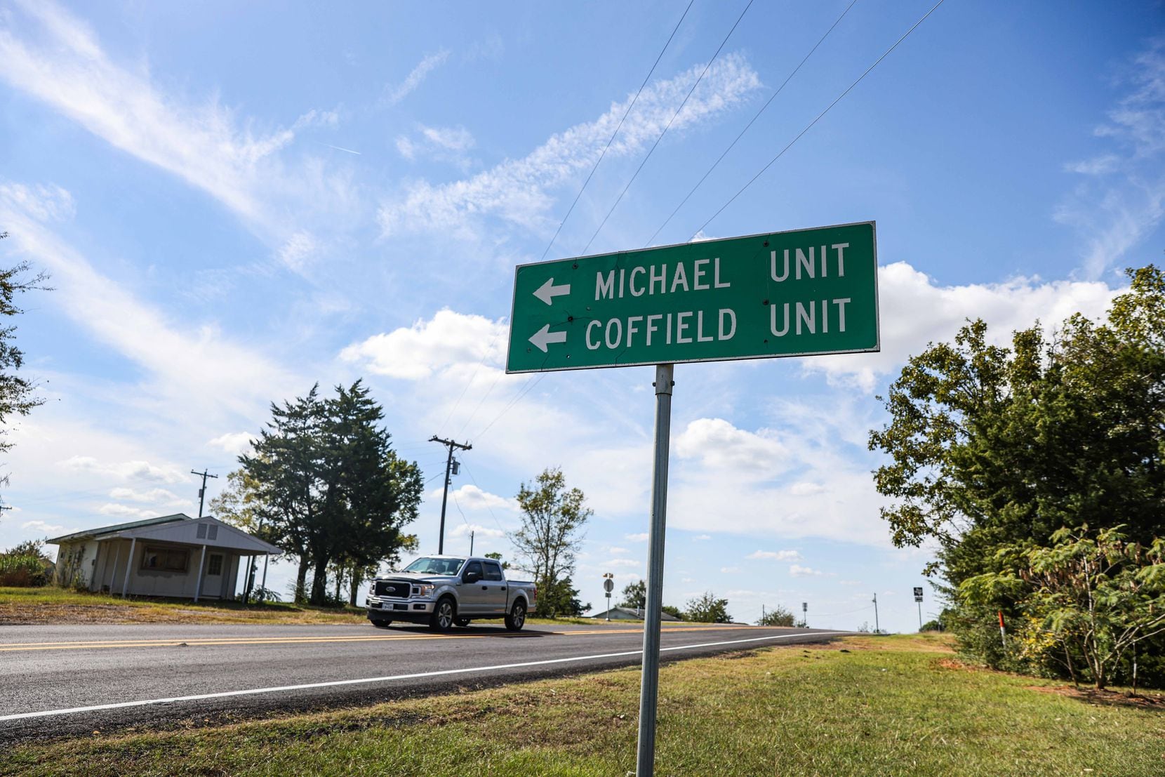 Signs mark the Michael and Coffield Units on a country road in Tennessee Colony, Texas. The...