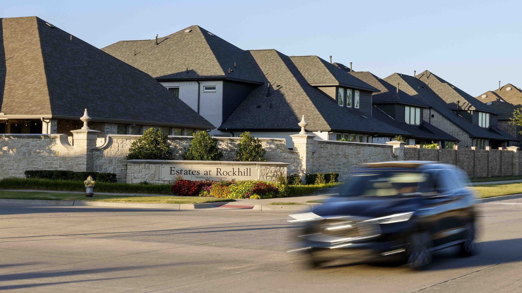 Traffic passes by the front entrance of the Estates at Rockhill on June 29, 2022. The...