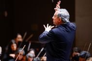 Music director Fabio Luisi leads the Dallas Symphony Orchestra and solo cellist Jan Vogler...