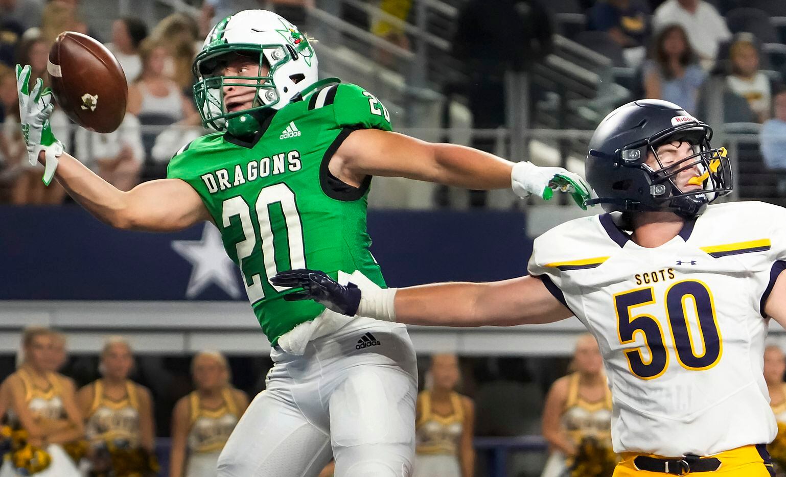 Southlake Carroll running back James Lehman (20) makes a one-handed catch for a touchdown as...