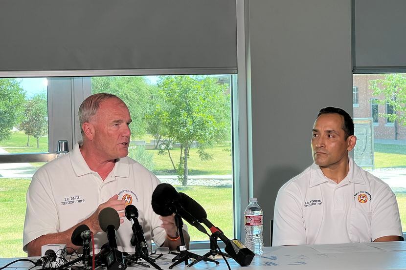 Fort Worth Fire Department Chief Jim Davis and Roberto 'Bobby' Fimbres at a press conference...