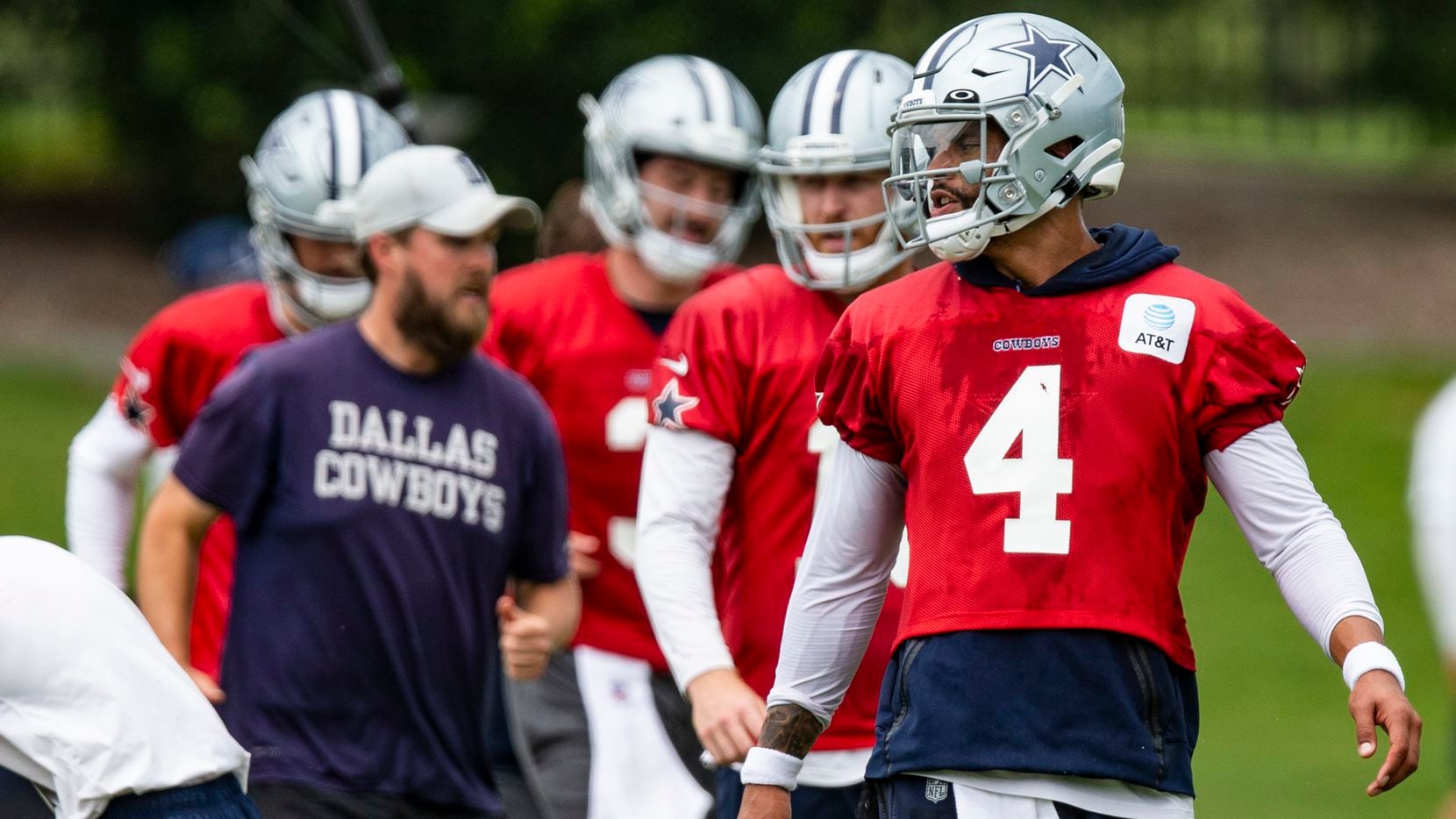 Dallas Cowboys quarterback Dak Prescott (4) looks on during practice at The Star in Frisco,...