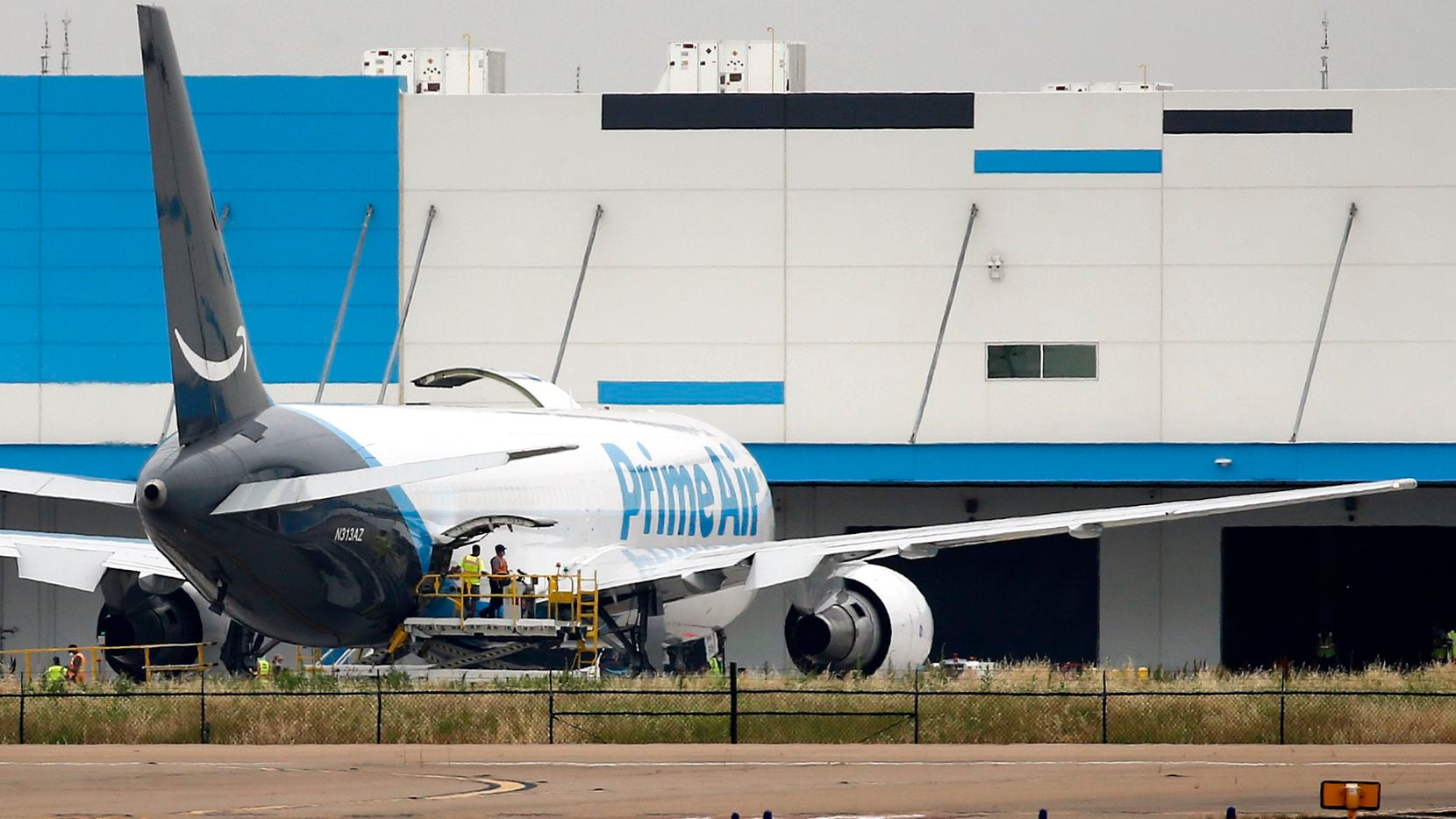 An Amazon Prime Air cargo plane is loaded at Alliance Airport in Fort Worth in 2020.