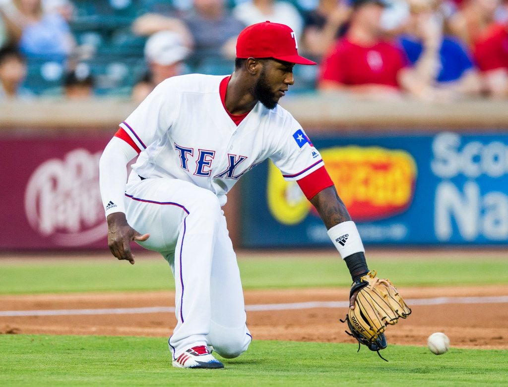 Texas Rangers shortstop Jurickson Profar (19) catches a ball during the first inning of an...