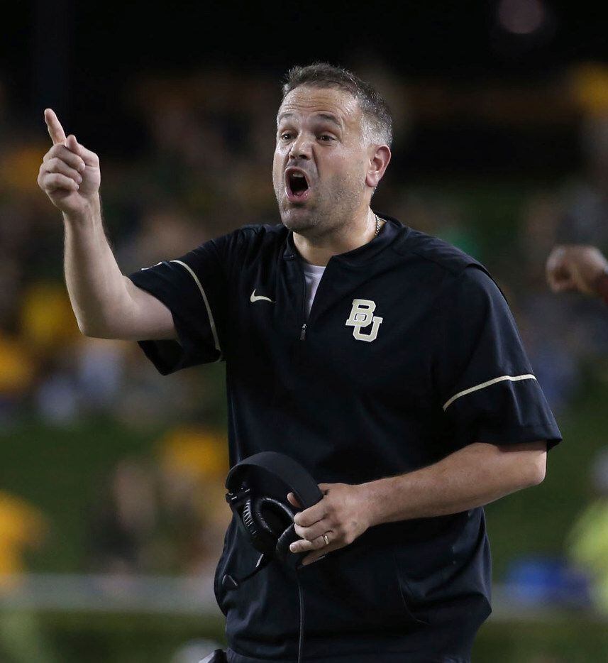 Baylor head coach Matt Rhule reacts to a play against West Virginia in the first half of an...