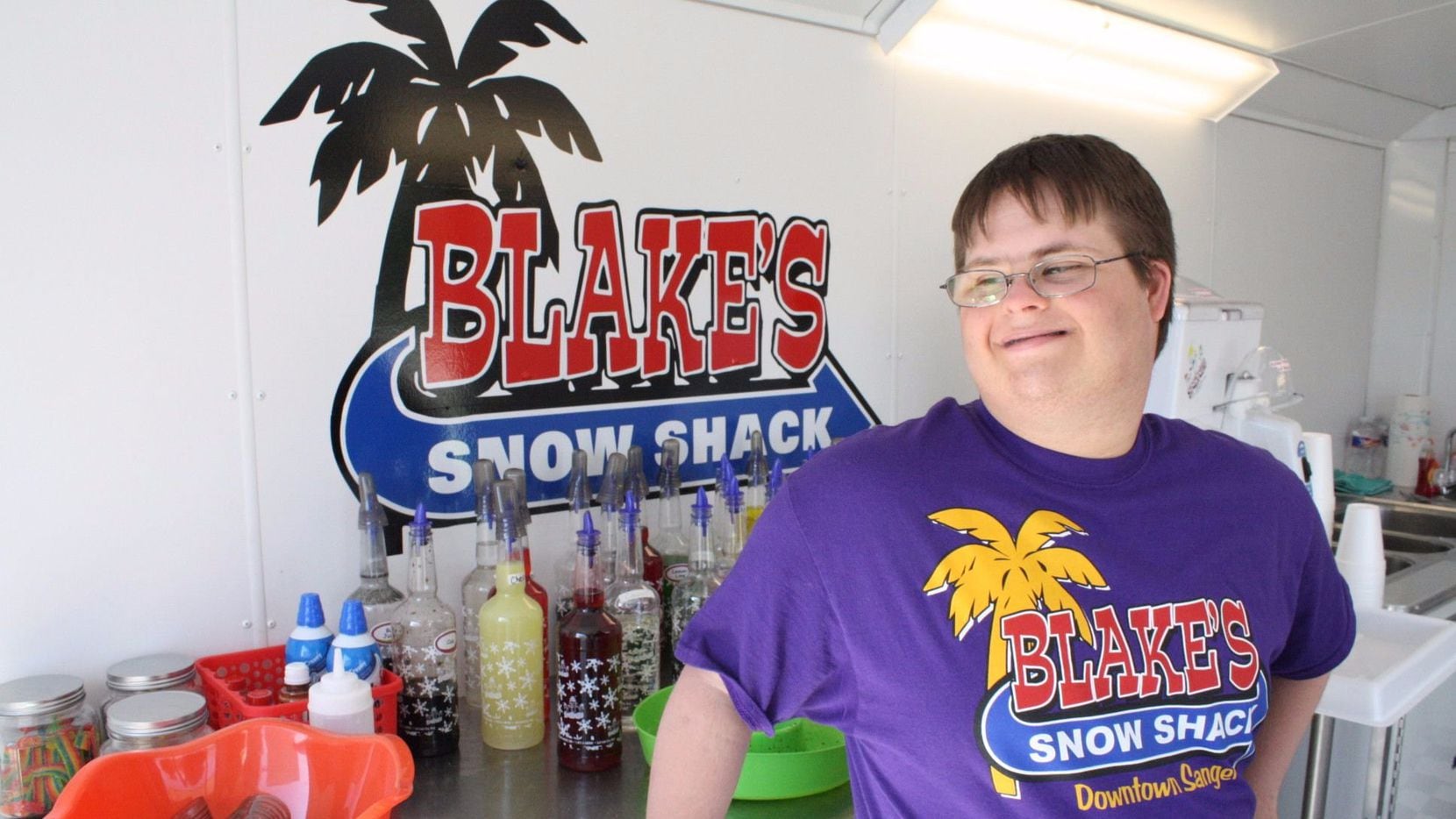 Blake Pyron stands inside his snow cone shack just days ahead of the grand opening on May 7. Pyron is the youngest business owner in Sanger, and the only one with Down Syndrome.