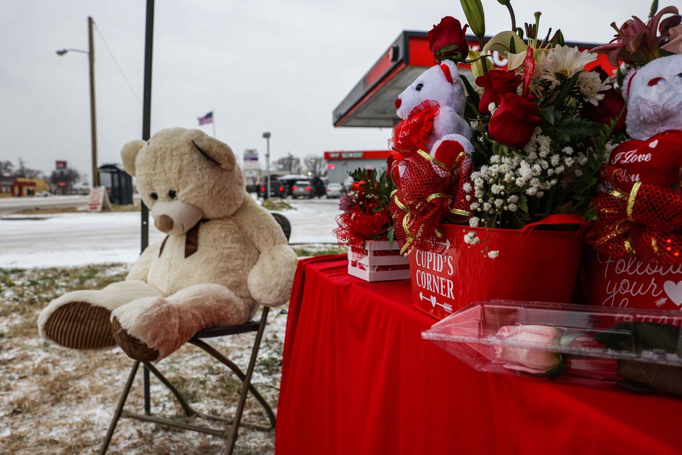 At the corner of Community Drive and TX-12 Loop Northwest Maria Olvera and Amparo Mejias have a stall selling floral decorations for Valentine's Day in Dallas on Sunday, Februaryn 24, 2021. Olvera said that due to the snowstorm, sales have been low.
