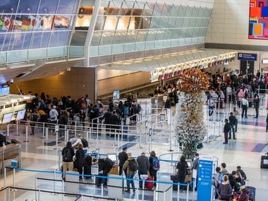 Four days before Christmas in 2019, travelers waited through long security lines at DFW International Airport's Terminal D.