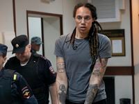 FILE - WNBA star and two-time Olympic gold medalist Brittney Griner is escorted from a...