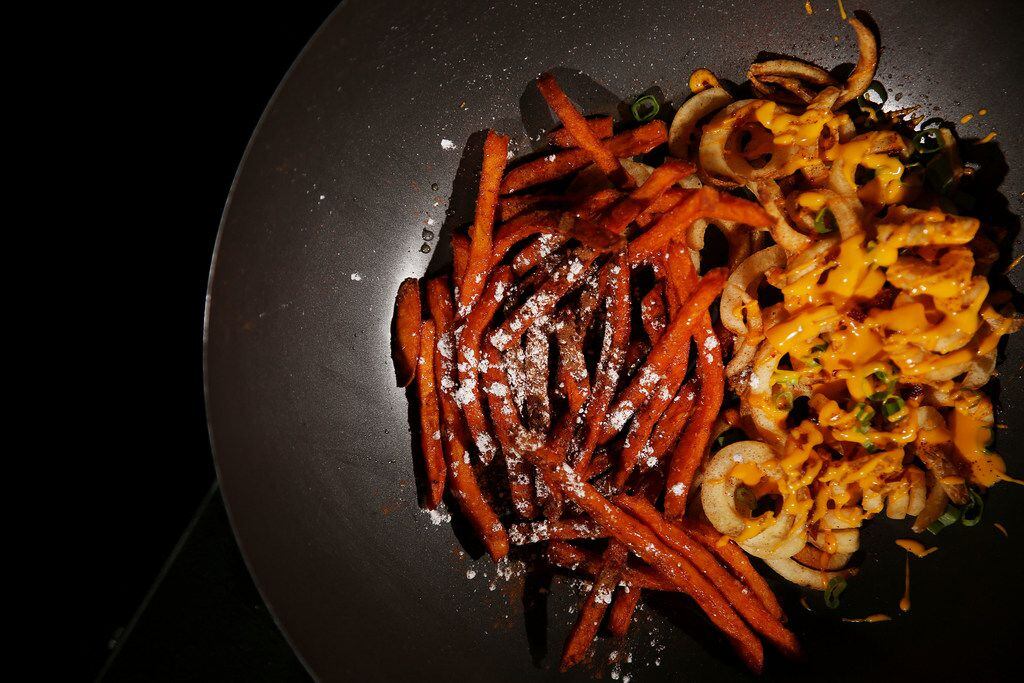 Sweet Tooth fries, sweet potato fries drizzled with maple syrup and dusted powdered sugar...