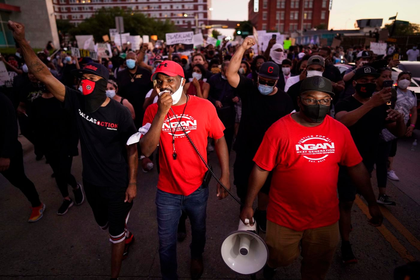 Dominique Alexander, the head of Next Generation Action Network, leads a march against...