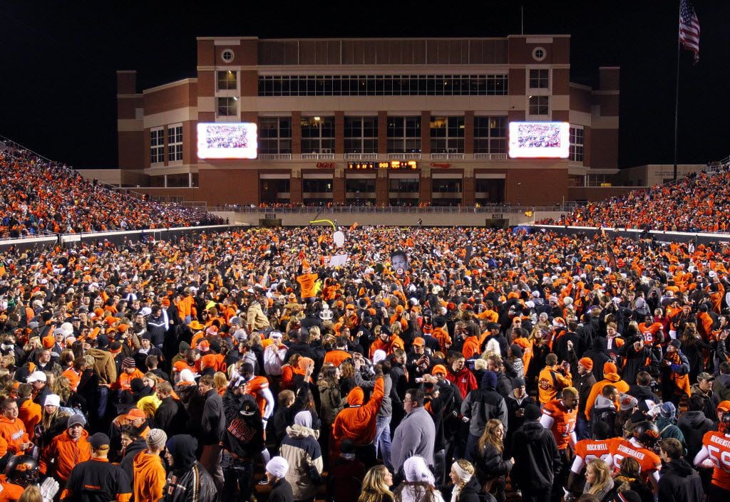It was bedlam following Oklahoma State's win over Oklahoma as fans flooded the field at Boone Pickens Stadium in Stillwater, OK, Saturday, December 3, 2011.  OSU won the Big XII title with their 44-10 win.