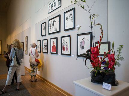An ikebana floral arrangement is among the works on display as part of the Association of...
