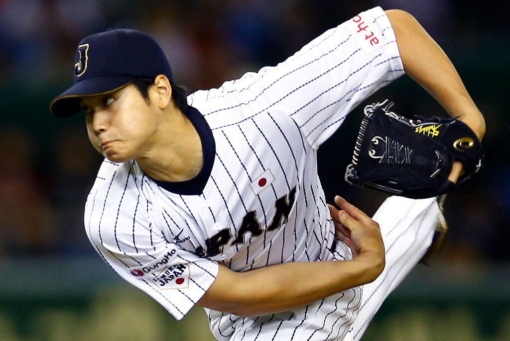FILE - In this Nov. 19, 2015, file photo, Japan starter Shohei Otani pitches against South...