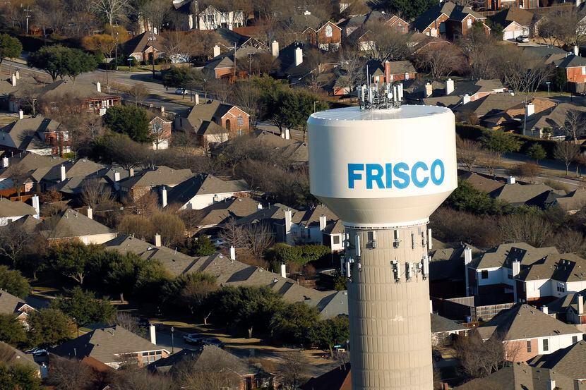 Frisco water tower and homes in Frisco, Texas on Friday, February 28, 2020.