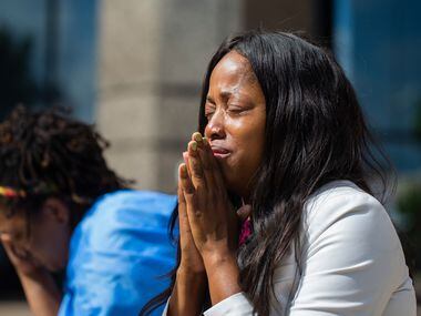 Tamara Neil is overcome with emotions as she and Safiya Paul of St. Lucia talk after Amber...